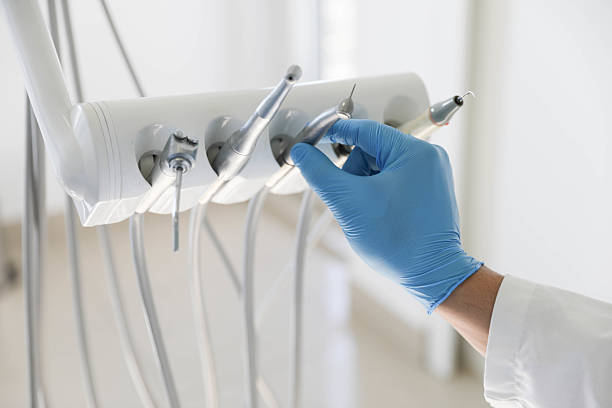 Professional Tooth Extraction technician working in New Albany, IN